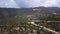 Amazing aerial view in picturesque mountains in summer day, serpentine roads