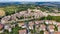 Amazing aerial view of San Quirico medieval town in Tuscany