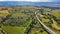 Amazing aerial view of San Quirico medieval town in Tuscany