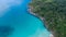 Amazing Aerial view of sea waves hitting rocks with turquoise sea water Beautiful seascape in the Phuket island coastline Thailand