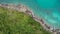 Amazing Aerial view of sea waves hitting rocks with turquoise sea water Beautiful seascape in the Phuket island coastline Thailand