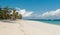 Amazing african beach with palms and horizon on the background