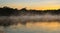 amazing amazon river with mist in a sunrise