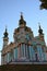 Amazing ancient Saint Andrew Church against vibrant blue sky. Famous touristic place and travel destination in Kyiv, Ukraine