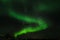 Amazing aurora borealis made in iceland, incredible patterns cover the sky, green light plays with unusual patterns