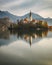 Amazing autumn scenery of lake Bled with and island reflection