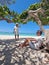 Amazing Baby Beach and coast on Aruba, Caribbean, white beach with blue ocean tropical beach, couple man and woman mid