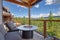 Amazing balcony patio with fire pit and forest and mountains view. Dream come true home exterior. New AMerican architecture.