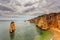 Amazing beach at sunrise. Algarve in the south of Portugal is a travel vacation destination for many tourists. Beautiful cliffs, c