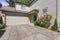 Amazing beige townhouse exterior on a bright sunny day.