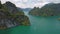 Amazing Birds Eye View on Sailing Wooden Boats at Cheow Lan Lake. Surat Thani Province, Thailand. Aerial HD.