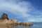 Amazing blue lake Malawi or Nyasa surrounded by stones on the beach in Africa.