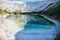 Amazing blue lake in the white mountains. Fantastic space landscape on the Earth. Beautiful nature view. Shadows and reflection of