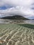 Amazing blue sea with white sand underwater in Sardinia, Alghero, panorama background, ripple water surface with copy space