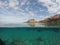 Amazing blue sea with white sand underwater in Sardinia, Castelsardo, panorama background, ripple water surface with copy space