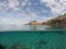 Amazing blue sea with white sand underwater in Sardinia, Castelsardo, panorama background, ripple water surface with copy space