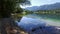 Amazing Bohinj Lake in the morning. Deep clear water with fish and gorgeous landscape of Bohinj valley in Julian Alps. Slovenia.