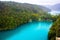 Amazing breathtaking landscape in Plitvice National Park, Croatia. Lakes and waterfalls in forest. Crystal clear azure blue water