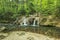 Amazing cascades and clear river in forest,Beusnita National Park,Romania