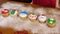 Amazing Christmas cupcakes lies on the table with sugar powder.