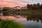 Amazing city view of Uzhhorod at sunset, scenic summer cityscape of old european town on the river Uzh, Zakarpattia, Ukraine