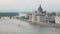 Amazing cityscape in Budapest, Hungarian Parliament Building, car traffic on embankment of Danube