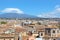 Amazing cityscape of Sicilian city Catania, Italy captured with majestic Etna volcano in the background. Snow on the very top of
