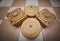 Amazing closeup view of old vintage woven storage baskets on ceramic tile floor