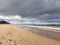 Amazing Cloud Formations in an Autumn Sky at the Beach with Reflections