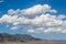 Amazing cloudly sky under mountains in south Kazakhstan