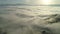 Amazing clouds of dense fog move flowing over mountain Sunrise or sunset sky fog scenic aerial view. Drone flies over sky