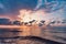 Amazing cloudscape above the sea at sunset