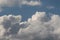 Amazing cloudy days. The glider flies through large white clouds.