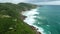 Amazing coastline with mountains and ocean with waves in Brazil, Florianopolis. Aerial view