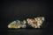 Amazing colorful rainbow Bismuth Gemstone on black background. Copy, empty space for text