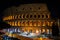 Amazing colosseum stadium exterior illuminated at night