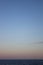 Amazing contrast of orange and blue colors at sunset on the beach of copacabana