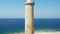 Amazing Croatia, lighthouse tower of Veli Rat on the island of Dugi Otok on Adriatic coast, sea horizon in background.