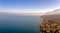 Amazing drone shots above the french lake side town of Evian Les Bains in France.