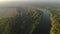 Amazing and fabulous landscape of winding river and forest at dawn in the fog