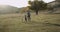 Amazing family day dad with his son running together beside of their husky dog at nature , beautiful amazing view.