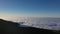 Amazing flight over the clouds in Teide national Park, Tenerife, Canary Islands, Spain.Sunset above the clouds