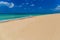 Amazing golden sand beach near Monopolli Capitolo, clear sky summer day, Apulia region, Southern Italy