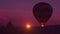 Amazing heavenly background - huge colorful hot air balloon flies in glowing sunset sky