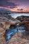 Amazing hidden beach and rocks in Milatos, Crete, Greece during sunset