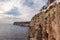 Amazing hidden cafe bar on the rocks on the island of Menorca, Spain