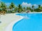 Amazing inviting view of VIP swimming pool area and grounds at Grand Aston hotel, resort on sunny gorgeous summer day, clear blue