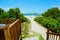 Amazing inviting walk way from a beach bar leading to beautiful white sand beach and ocean at Las Brujas island, Cuba