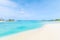 Amazing island in the Maldives ,Beautiful turquoise waters and white sandy beach with blue sky background