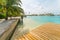 Amazing island in the Maldives ,wooden bridge and beautiful turquoise waters with blue sky background for holiday vacation